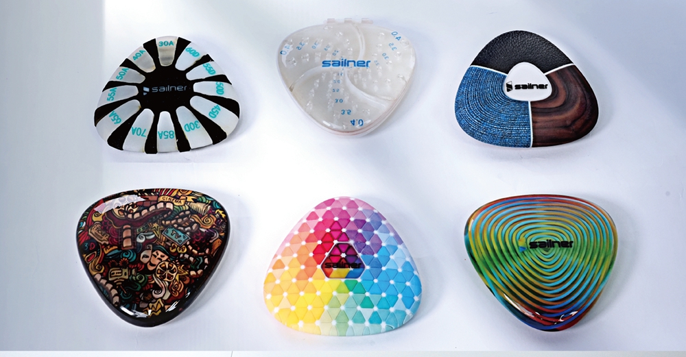 Printing from J400 Plus<br/> Examples of printed materials made of transparent, semi transparent, full-color, soft and hard materials